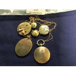 A mixed lot of yellow metal pendants and lockets, including a circular engine turned locket,