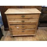 A 19thc Continental stripped pine chest of drawers, the rectangular top with moulded edge and canted