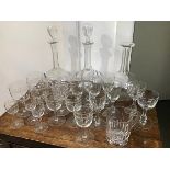 A mixed lot of glassware including three cut and etched decanters together with a mixed lot of