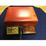 A red morocco leather Italian jewellery box with velvet fitted interior, with open tray and ring