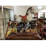A vintage 1950s Mobo Prairie metal rocking horse, decorated in polychrome enamels (h.88cm x 96cm x