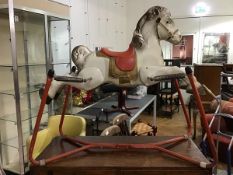 A vintage 1950s Mobo Prairie metal rocking horse, decorated in polychrome enamels (h.88cm x 96cm x