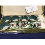 A set of eight Chinese Republic cloisonne napkin rings with floral and butterfly decoration, in