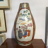 A 19thc Japanese baluster vase, decorated with figures enclosed within crysanthemum and exotic