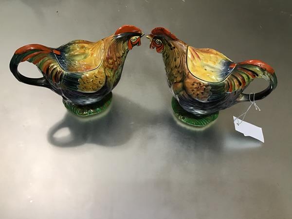 A pair of 1930s/40s English pottery novelty rooster teapots decorated with polychrome enamels, one