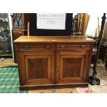 A late Victorian walnut chiffonier base, lacking superstructure, the rectangular top above a pair of