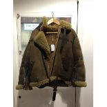 An Irvin sheepskin flying jacket by Aviation Leathercraft, sized 14, with suede outer black