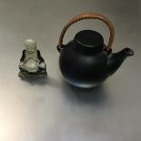A Finish Arabia black glazed Japanese inspired tea pot with raffia handle (h.12cm x 17cm (