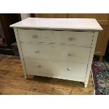 An early 20thc chest of drawers, the rectangular top above three long drawers, raised on turned