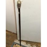 Nelson Interest: a 20thc walking cane, the bulbous resin handle engraved with a portrait of Nelson