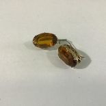 A pair of vintage Russian silver gilt citrine coloured glass oval earrings in openwork claw set