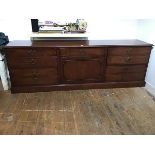 A mahogany filing cabinet in the form of a Georgian chest of drawers, the rectangular moulded top