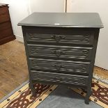 A mid 20thc. grey painted chest, in the French style, the rectangular moulded top above four