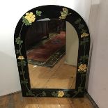 Continental hand painted and ebonised arched frame wall mirror with crysanthemum border and bird