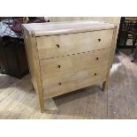 A Habitat three door chest, the rectangular top with rounded angles above the three drawers with