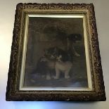 A Victorian crystoleum depicting two Kittens and a Puppy in gilt composition frame (22cm x 17cm)