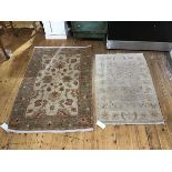 A modern handwoven wool rug of Persian design, the pale field decorated with interwoven stylised