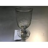 A 19thc engraved wine glass with Forget Me Not inscribed on two sides, on spreading foot (h.13cm x