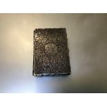 A Victorian aide memoire with Chester silver cover with allover engraved boteh and S scroll