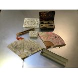 A faux tortoiseshell manicure set c.1920, an Indian mother of pearl inlaid box, a dish and three