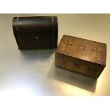 A Victorian dome top calamander wood brass inlaid tea caddy with hinged top enclosing two