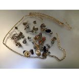 A quantity of assorted jewellery including earrings, gilt metal chains, 9ct gold chains, a Maltese