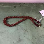 A carnelian graduated bead necklace with barrel clip fastening (19cm)