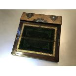 A Victorian burr walnut mother of pearl inlaid slope front writing box, the fold down flap with