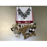 A collection of costume jewellery including a Butler & Wilson paste set floral necklace, earrings,
