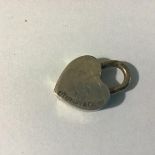 A vintage Tiffany heart shaped padlock, engraved Mum, inscribed verso, Tiffany & Co. 925 (2.2cm x