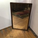 An Edwardian oak framed rectangular mirror (73cm x 43cm)