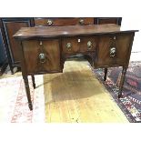 A late Regency mahogany sideboard, the rectangular top with reeded edge above a pair of steep