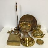 A mixed lot of brassware including a decorated box with hinged lid and wooden interior, a dog, a