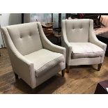 A pair of stained beech framed button back club style chairs upholstered in soft fawn tweed check