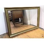 A modern mirror within a moulded gilt frame (69cm x 99cm)