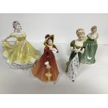 A group of four Royal Doulton china figures, Nanette HN2378, Julia HN2705, Veneta HN2722 and Fair