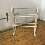 A modern white painted five bar towel rail, with arched and turned supports (73cm x 63cm x 30cm)