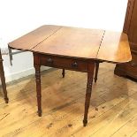 An early Victorian pembroke table, with a rectangular top with moulded edge over a single frieze