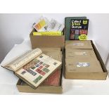 Three boxes containing a collection of First Day British Covers, various loose stamps in envelopes
