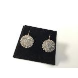 A pair of Italian 9ct gold bombe style earrings with millegrain set rose cut diamonds, with hook