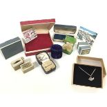 A collection of vintage ring and jewellery boxes including a velvet covered ring box and a 1930s