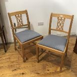 A pair of beech and birch side chairs in the Georgian style, each moulded square back incorporting a