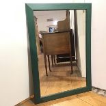 A wall mirror within an emerald green painted frame (98cm x 68cm)