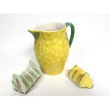 A Crown Devon lemonade textured jug with green handle (h.20cm), a Caltonware pottery four division