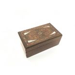 An Eastern sandalwood box with inlaid mother of pearl, copper etc., in stylised decoration (4cm x