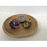 A Selkirk Glass apple paperweight and a millefiore style paperweight, a treen duck and bowl (4)