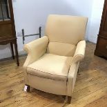 A modern easy chair in the Victorian style, the back, arms and seat upholstered in a lemon