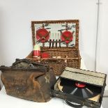 A mixed lot including wicker picnic set complete with plates, flask etc., a gladstone style doctor's