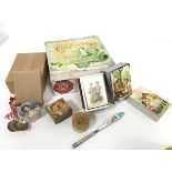 A mixed lot comprising seven various Edwardian cardboard boxes with decorative covers, including