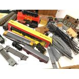 A part model railway including a box of rails, transformers etc., model dioramas including signal